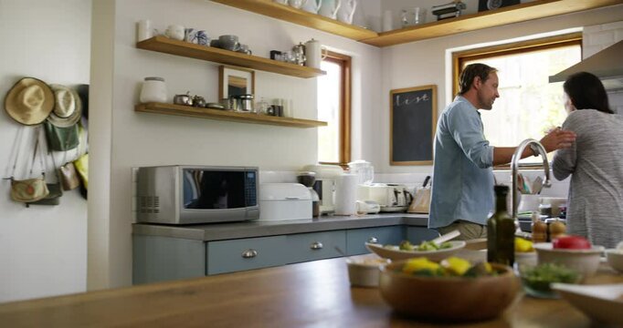 Couple, kitchen and cooking food for dinner, taste test and smile with okay sign, nutrition and happy together. Man, woman and healthy in home, vegan diet and bond with wine, dining table or island