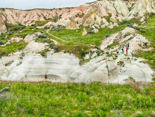 Group of tourists exploring the breathtaking turkish landscape of cappadocia