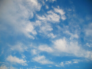 white gray clouds against blue sky