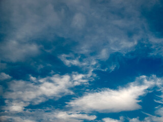 white gray clouds against blue sky