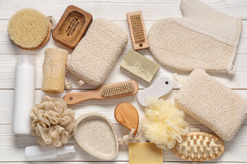 Composition with different bath supplies on white wooden background