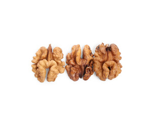 Tasty peeled walnuts on white background
