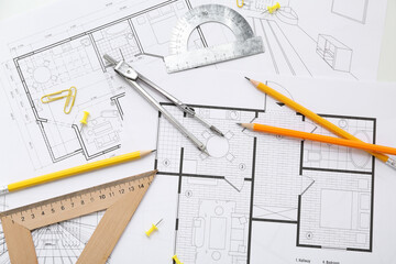 Architect's supplies on house plans, top view