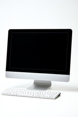 Fototapeta premium Modern desktop computer with a blank screen, perfect for office or home use, isolated on a white background.