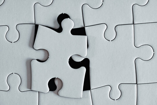 The last piece of a puzzle that is near its final position