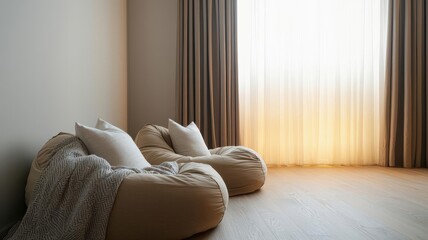 Fototapeta premium Cozy interior featuring two stylish bean bags by a sunlit window, enhancing a serene and inviting atmosphere.