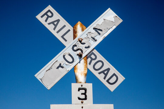 Worn railroad crossing sign, Winona, Washington State