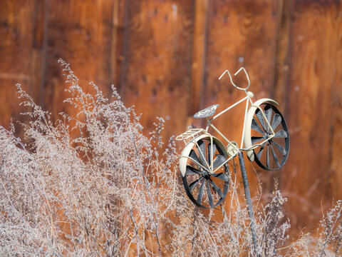 USA, Washington State, Cle Elum. Metal bicycle ornament along a roadside.