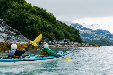 Kayaking in Glacier Bay National Park in southeastern Alaska in summer