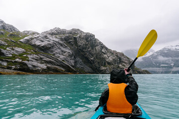 Kayaking in Glacier Bay National Park in southeastern Alaska in summer