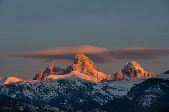USA, Wyoming. Alpenglow on Grand Teton and Table Mountain as seen from west.