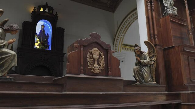 Church interior in Sri Lanka with statues and sculptures
