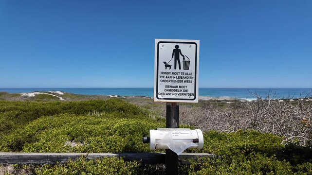Yzerfontein, West Coast, South Africa. 27.03.2024. Video, Dog poo  bag collection point on the seafront in Yzerfontein South Africa.