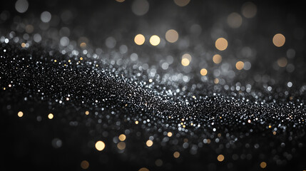 Dark background with shimmering silver gray particles and scattered golden lights.