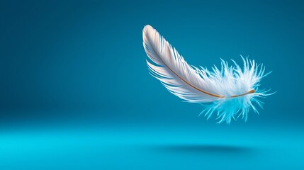 Naklejka premium A delicate feather floats gracefully against a vibrant blue background, symbolizing lightness and freedom.