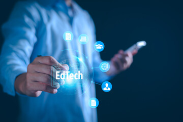 EdTech Education Technology concept, Businessman with virtual electronic learning online, EdTech future technology, essential education about business skill development