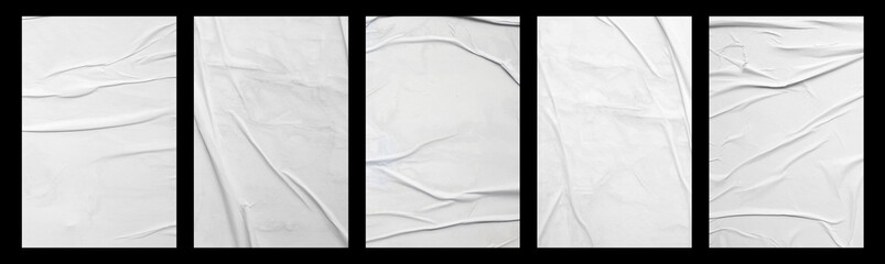 white crumpled and creased glued mockup paper poster template set isolated on black background