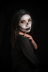 Woman with Day of the Dead Makeup in a Dramatic Pose