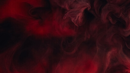Explosion smog. Paint water splash. Defocused black red color glitter particles texture fume cloud dark abstract art background.