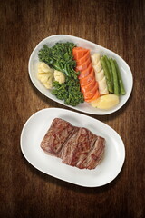Grilled Filet Mignon with vegetables seen from above