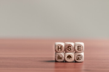 HSE, Health safety environment concept, Standard safe industrial work and industrial. HSE icon on wooden blocks for business and organization.