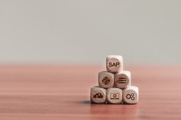 SAP or ERP enterprise resources planning system concept, Wooden blocks with SAP icons for business process automation software and management software (SAP)