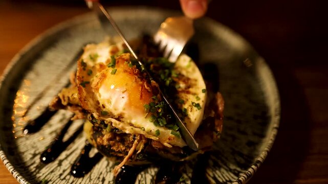 Cutting into a Gourmet Egg Dish