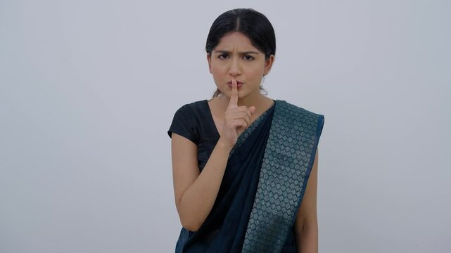 Indian Woman in Saree Shusing in the Camera
