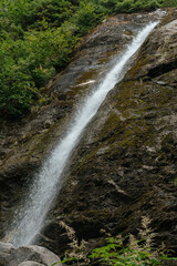 Fototapeta premium Small waterfall at Mendenhall in Tongass National Forest in Juneau Alaska 