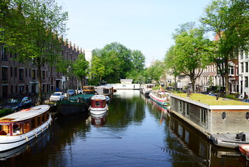 Obraz premium Typical Canal in the Old Town of Amsterdam, Netherlands