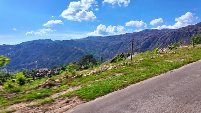 Driving with the car through the Peneda Geres National Park in Portugal, Europe. Area betweeen Cabril und Ruivaes