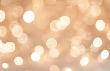 Obraz premium Defocused abstract bokeh background beige pastel colored, flare from lights, beige monochrome photo