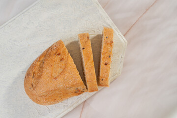 White sliced ​​bread lies on a light background