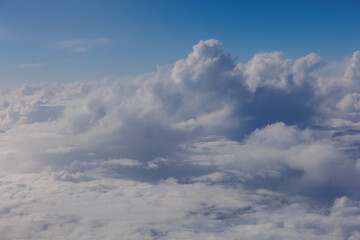 Aerial View Beauty white clouds on blue sky soft sun light, Nature view fluffy clouds on pastel blue sky background