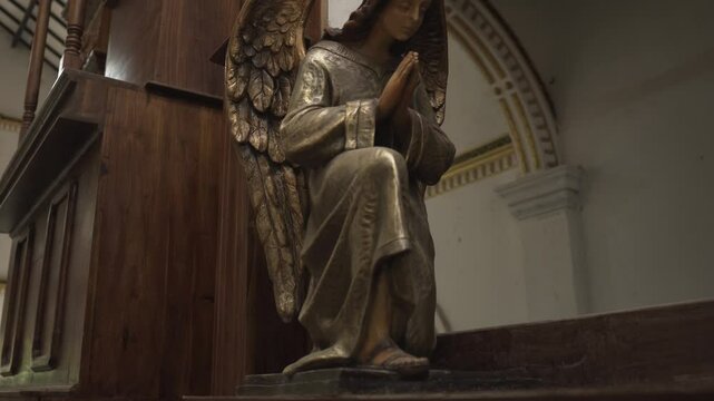 Church interior in Sri Lanka with statues and sculptures
