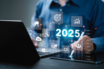 Businessman plan strategy marketing and finance to goal in 2025 planning business growth with technology AI and environmental care to New Year resolutions business. digital transformation 2025