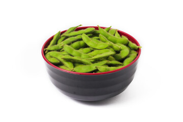 Black Bowl Filled with Vibrant Green Edamame Beans Isolated on White Background
