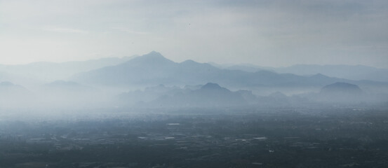 Dark mountains in the mist