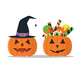 Halloween pumpkins with candies and witch hat. Concept for Halloween and theme parties.