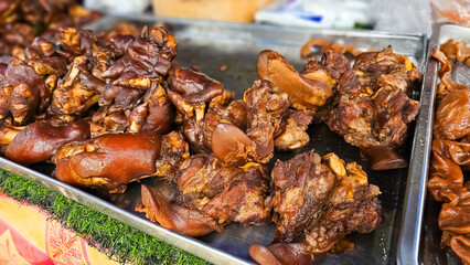 Thai braised pork leg. Pile of Thai Pork Leg Stew. Thai stewed pork leg. Galbijjim, kagi
