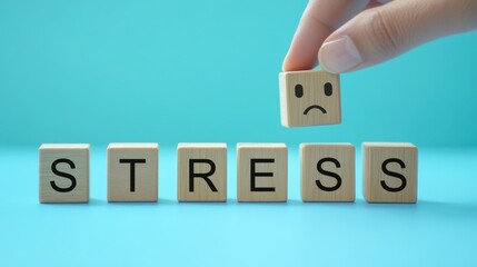 Stress wooden block with blue bacgrkound for sad and depression state of mind.