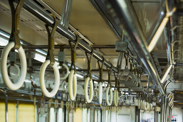 Bus and train passenger handgrips