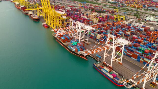 Hyper lapse time lapse day to night Cargo Container Ship international customs sea port. Crane loading cargo working at industry port. working at night shift import export shipping concept.