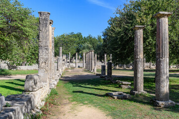 Ancient ruins under clear blue sky. Echoes of Antiquity..
