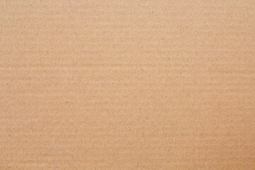 Cardboard sheet texture background, detail of recycle brown paper box pattern.