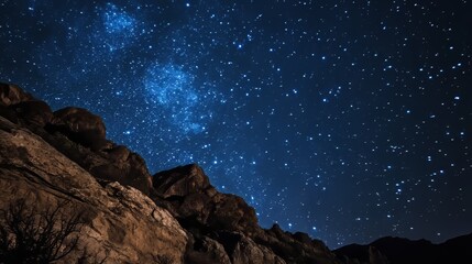 A night sky filled with stars, using long exposure to show the movement of the stars. --ar 16:9 --v 6.1 Job ID: 1ce20956-d303-4bae-b91b-7121ecb61417