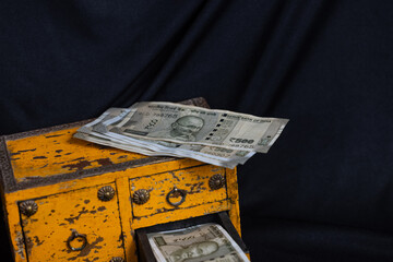 Indian 500 Rupee note background with yellow almirah, Indian note background, price hike.