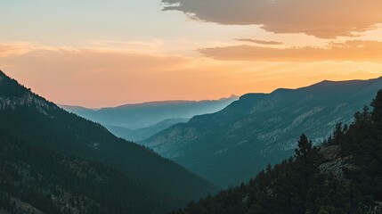 Breathtaking mountain vista at sunset, with plenty of space for copy.
