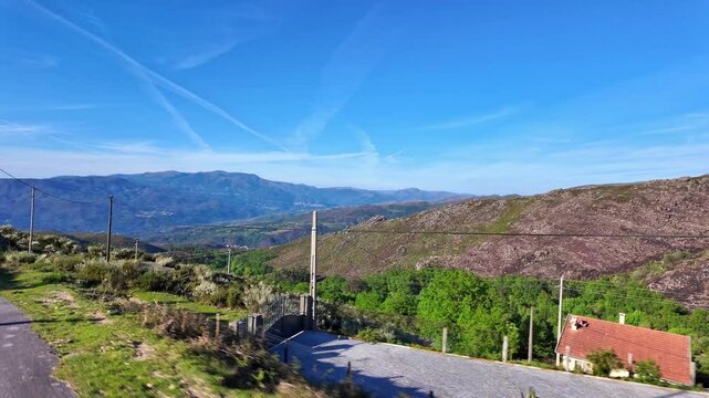 Driving with the car through the Peneda Geres National Park in Portugal, Europe. Area around Ponte da Barca