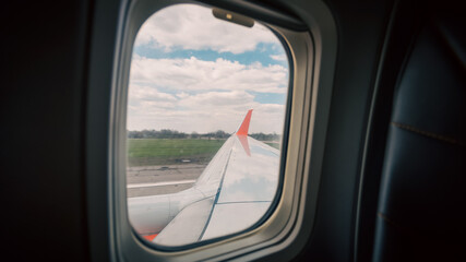 Naklejka premium view from the airplane window of the airport during takeoff